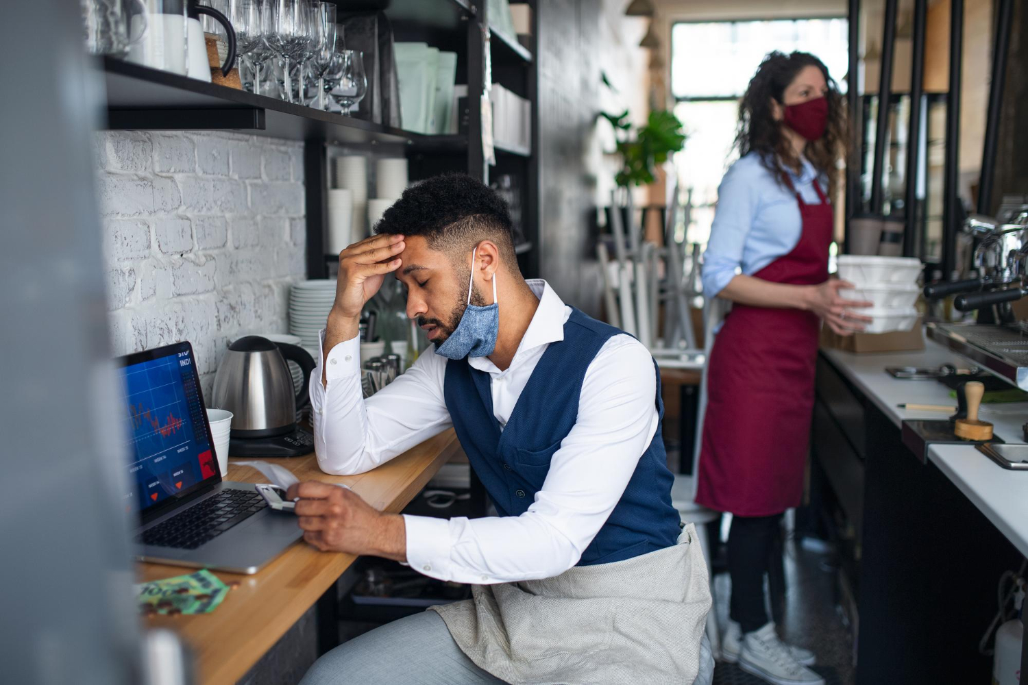 Restaurant manager reviewing shift rules and compliance requirements
